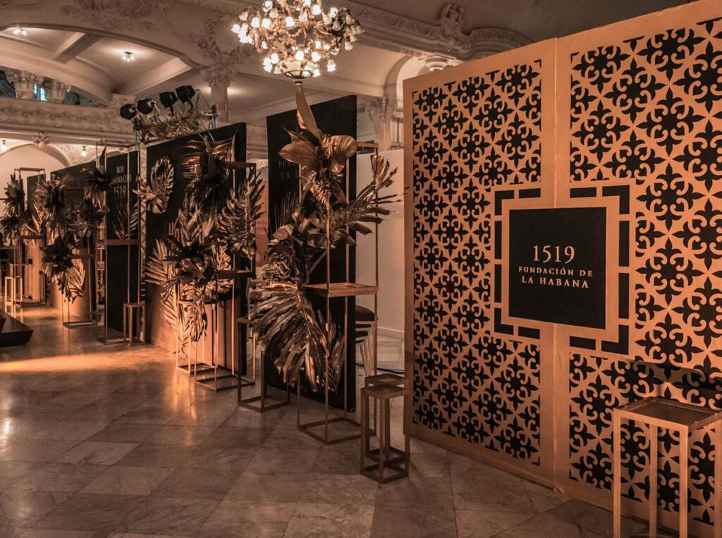 Decoration with golden leaves and panels at the Havana Club luxury event in the Grand Theater of Havana