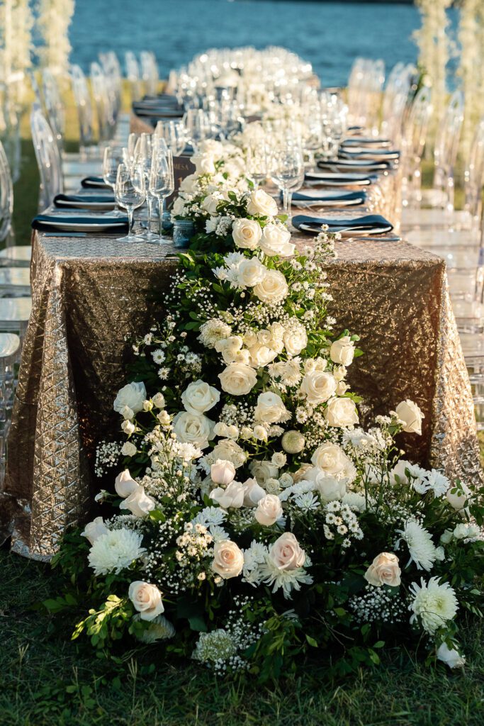 cascading floral arrangement on the main wedding table at La Divina Pastora