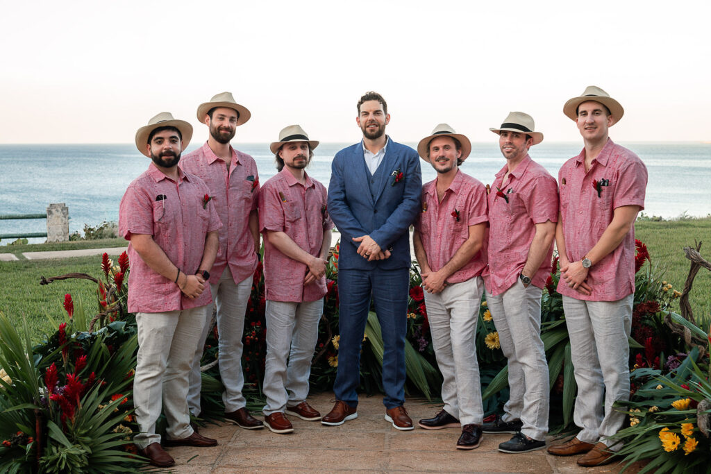 Brett with his wedding party by the sea at the Hotel Nacional